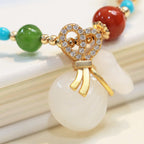 Fortune Jewel Natural Hetian White Jade 14K Gold Plated Money Bag Blessing Bracelet