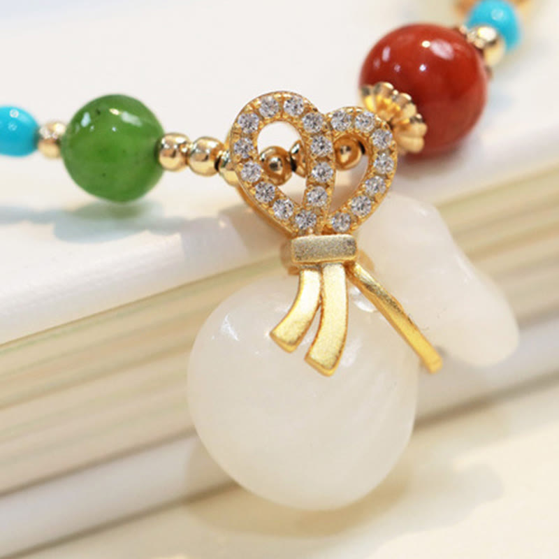 Fortune Jewel Natural Hetian White Jade 14K Gold Plated Money Bag Blessing Bracelet